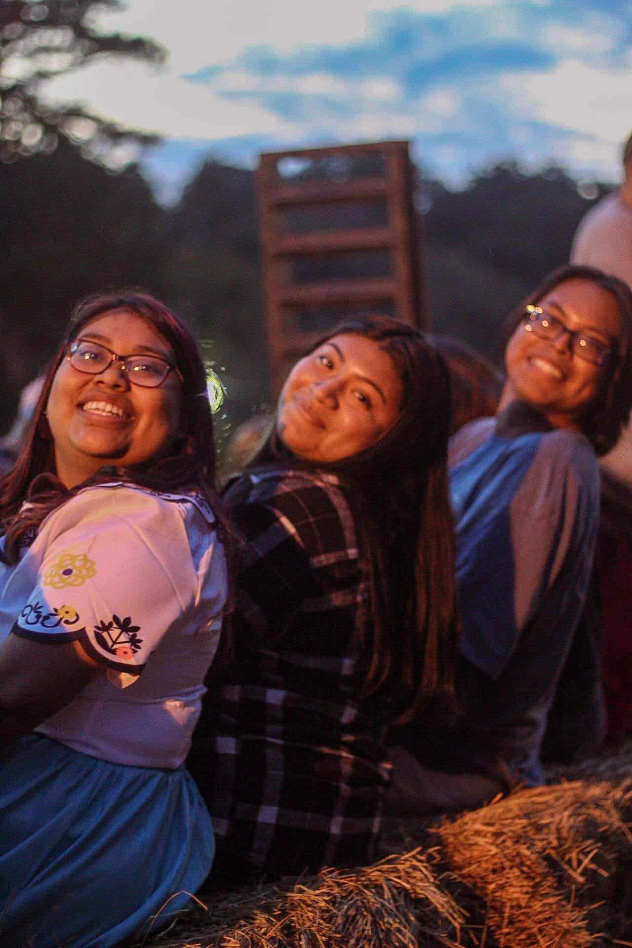 Friends smiling together at a Hope House Church small group gathering